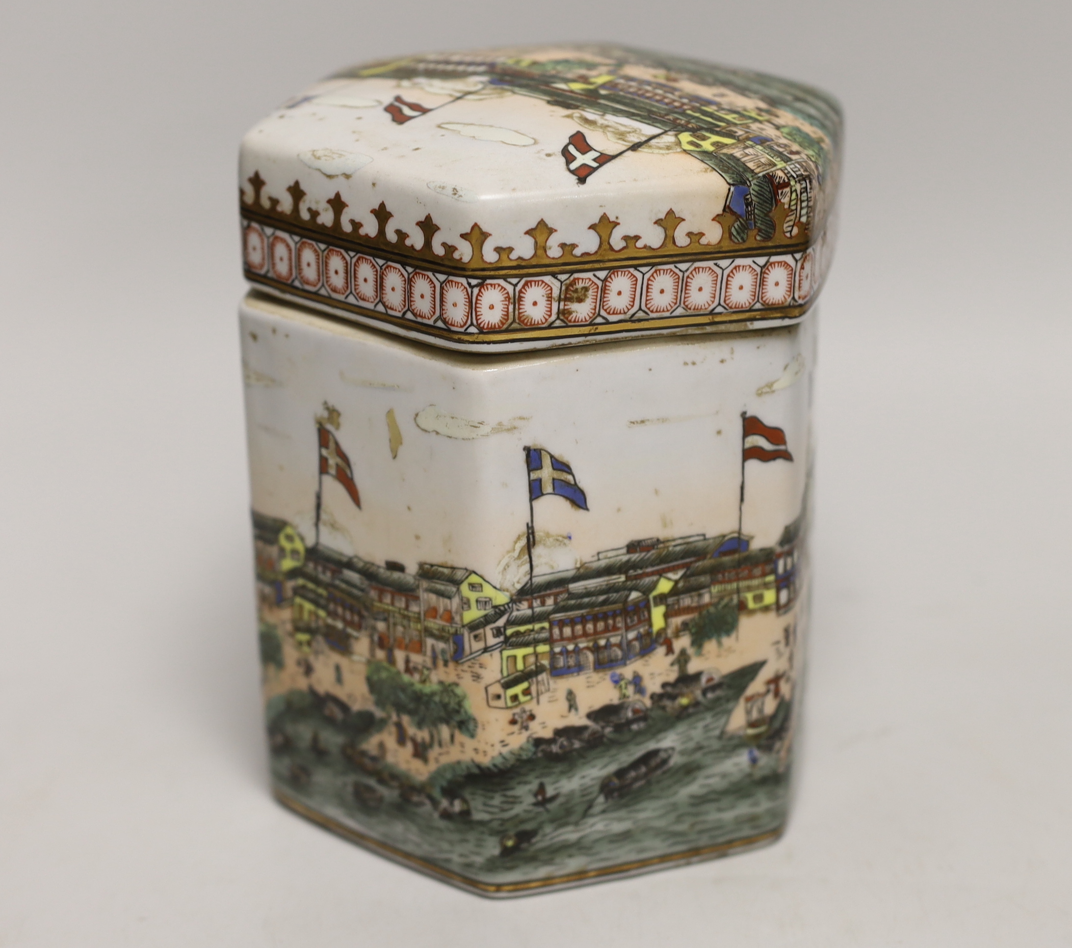 A Chinese hexagonal tea canister, decorated with the Hongs of Canton, 17cm